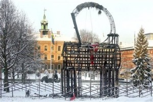 The charred remains of a Christmas straw goat stands in the town center of Gavle, Northern Sweden, on Wednesday Dec. 23, 2009.
